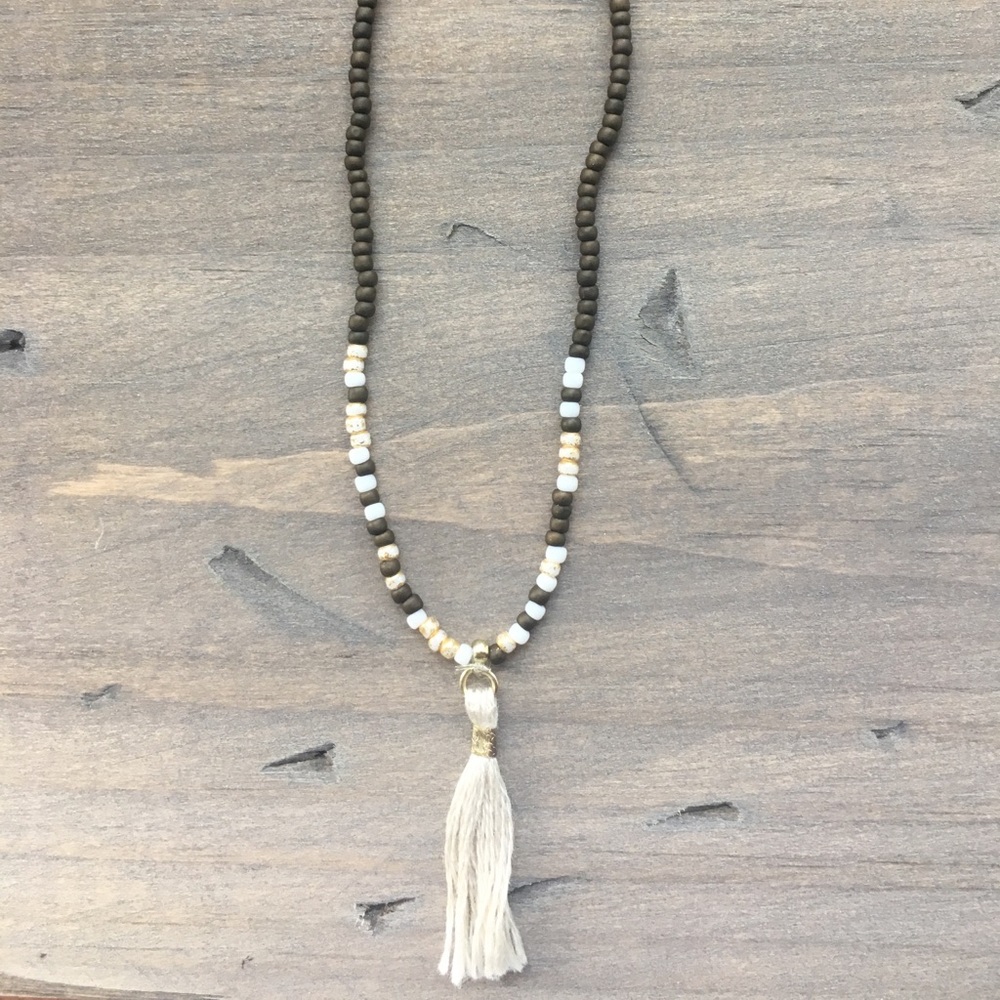Brown and gold tassel bracelet